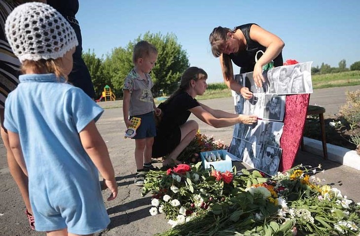 Ukraine commemorates victims of MH17 tragedy  - ảnh 1